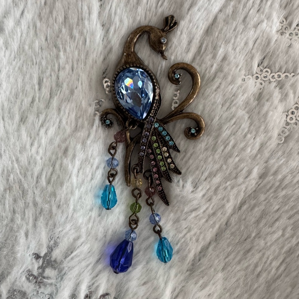 Elegant Peacock Brooch with Blue Gemstones